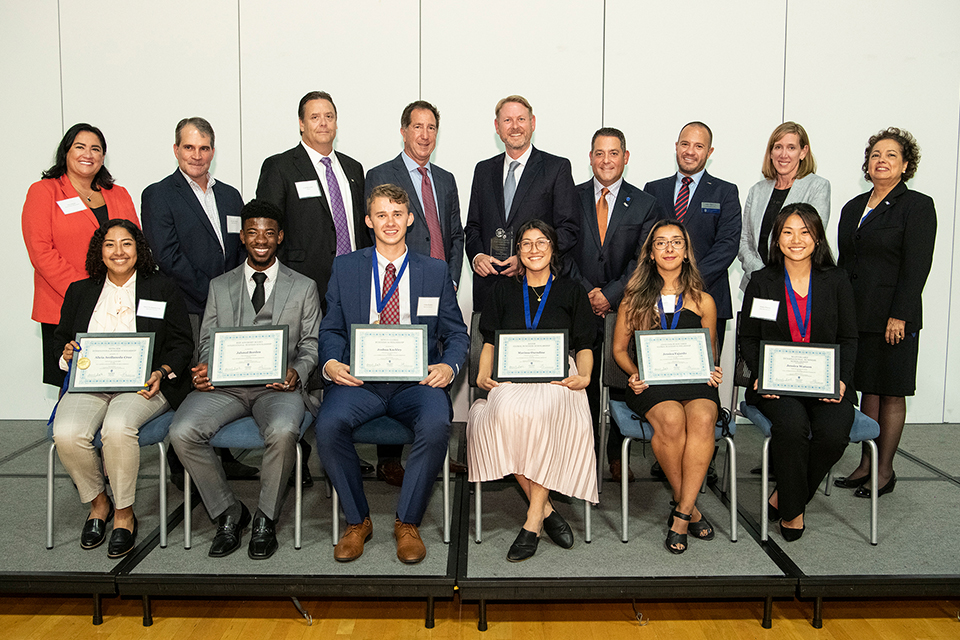 2021 International Business Awards Honorees Pose On Stage for a Group Photo with their Awards