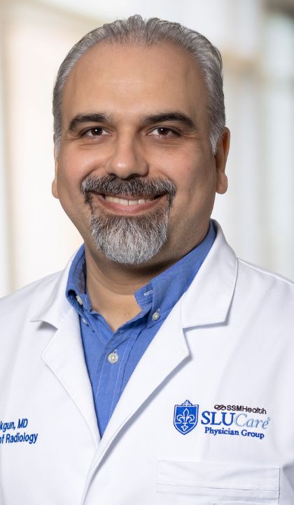 Headshot of Veysel Akgun