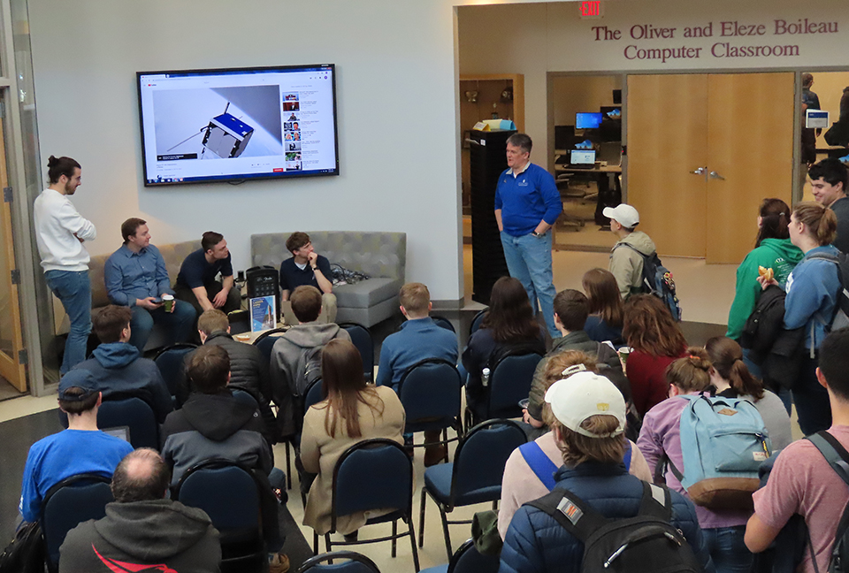 A crowd gathers in the lobby of McDonnell Douglas Hall on Feb. 19 to watch the launch of the Argus-2 from the International Space Station.