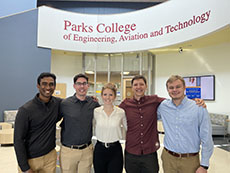 Kelly Kulig, Connor McCormac, Michael Nickerson, Carl Pickhardt, Aneesh Reddlapalli posed inside McDonnell Douglas Hall